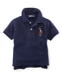 A classic polo shirt is updated with a multicolored Big Pony for preppy style. A classic polo shirt is updated with a multicolored Big Pony for preppy style.