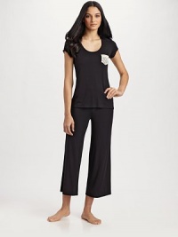 Lace details and a gathered back lend a feminine edge to a silhouette that's as stylish as it is comfy.Scoopneck Lace pocket Drawstring waist Inseam, about 25 95% modal/5% spandex Machine wash Imported Lace details and a gathered back lend a feminine edge to a silhouette that's as stylish as it is comfy.Scoopneck Lace pocket Drawstring waist Inseam, about 25 95% modal/5% spandex Machine wash Imported
