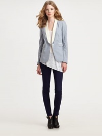 Pinstriped cotton twill with contrast lapels in an impeccably-tailored single-button blazer.Foldover lapelsDefined shouldersLong sleevesSingle-button closureFlap pocketsAbout 24 from shoulder to hemCottonDry cleanMade in USA of imported fabricModel shown is 5'10 (177cm) wearing US size 4. Pinstriped cotton twill with contrast lapels in an impeccably-tailored single-button blazer.Foldover lapelsDefined shouldersLong sleevesSingle-button closureFlap pocketsAbout 24 from shoulder to hemCottonDry cleanMade in USA of imported fabricModel shown is 5'10 (177cm) wearing US size 4.
