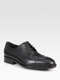 Classic captoe lace-up expertly crafted in Italy from smooth calfskin leather with perforated detail and a comfortable rubber sole.Leather upperLeather liningPadded insoleRubber soleMade in Italy Classic captoe lace-up expertly crafted in Italy from smooth calfskin leather with perforated detail and a comfortable rubber sole.Leather upperLeather liningPadded insoleRubber soleMade in Italy