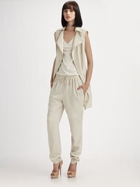 Parka-inspired details dress up this sleeveless zip-front design.Foldover collarAsymmetrical front zipSnap detailsFlap pocketsSide slash pocketsGathered hemlineBack vent with rivet detailsFully linedAbout 32 from shoulder to hem60% viscose/40% polyesterDry cleanImportedModel shown is 5'9 (175cm) wearing US size 4. Parka-inspired details dress up this sleeveless zip-front design.Foldover collarAsymmetrical front zipSnap detailsFlap pocketsSide slash pocketsGathered hemlineBack vent with rivet detailsFully linedAbout 32 from shoulder to hem60% viscose/40% polyesterDry cleanImportedModel shown is 5'9 (175cm) wearing US size 4.