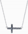 Symbolic style with a twist of modernity. This chic, sideways cross pendant features sparkling round-cut black diamonds (1/8 ct. t.w.) set in 14k white gold. Approximate length: 17 inches. Approximate drop: 1/2 inch.