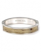 Add exotic edge to your accessory collection with MICHAEL Michael Kors' horn bangle. Whether you're downtown or on safari, this earth-toned bracelet loves bright separates and a wild itinerary.