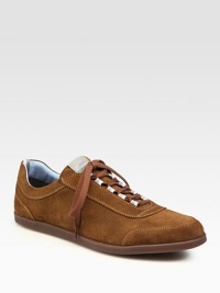 Sporty styling in supple Italian sueded calfskin elevates your casual wardrobe.Padded insoleRubber soleMade in Italy Sporty styling in supple Italian sueded calfskin elevates your casual wardrobe.Padded insoleRubber soleMade in Italy