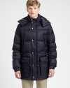 Remain cozy and dry all season long in this quilted nylon puffer, with down-fill for added warmth and large, over-sized pockets to secure all of your personal essentials.Zip-frontRemovable hoodChest slash, waist flap pocketsElasticized waistAbout 33 from shoulder to hemNylonDry cleanImported