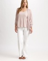 Equal parts elegant and relaxed, this slouchy style is knit from a finespun wool blend.Open frontThree-quarter dolman sleevesRib-knit cuffsCurved hemlineAbout 25¼ from shoulder to hem52% wool/33% modal/15% camelDry cleanImported of Italian fabric