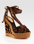 Slingback design of leopard-printed calf hair with leather trim, grosgrain ribbon laces and a chunky espadrille wedge. Calf hair and stacked rope wedge, 5½ (140mm)Stacked rope platform, 1½ (40mm)Compares to a 4 heel (100mm)Leopard-print calf hair upper with leather trim and grosgrain ribbonLeather liningSignaturee red leather solePadded insoleMade in Italy