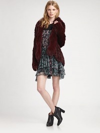 Natural rabbit and natural coyote fur give this silhouette irresistible, must-have-it-now appeal. Open-front designLong sleevesPull-on styleAbout 29 from shoulder to hemRabbit and coyote furDry clean by fur specialistImported of Italian fabricFur origin: China Model shown is 5'10 (177cm) wearing US size Small. Natural rabbit and natural coyote fur give this silhouette irresistible, must-have-it-now appeal. Open-front designLong sleevesPull-on styleAbout 29 from shoulder to hemRabbit and coyote furDry clean by fur specialistImported of Italian fabricFur origin: China Model shown is 5'10 (177cm) wearing US size Small.