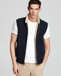 Thick and warm, this sherpa lined vest gives you a reliable and masculine outdoor option. Thick and warm, this sherpa lined vest gives you a reliable and masculine outdoor option.