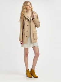 A timeless essential that embraces utility-chic, finished with a cinchable waist and hood.Drawstring hoodConcealed button placket over zip closureDrawstring waistFlap pocketsAbout 30 from shoulder to hemCottonDry cleanImportedModel shown is 5'11 (180cm) wearing US size Small. A timeless essential that embraces utility-chic, finished with a cinchable waist and hood.Drawstring hoodConcealed button placket over zip closureDrawstring waistFlap pocketsAbout 30 from shoulder to hemCottonDry cleanImportedModel shown is 5'11 (180cm) wearing US size Small.