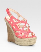 Natural cork wedge enhanced by a maze of shiny leather straps and a classic espadrille platform. Cork-covered wedge, 6 (150mm)Espadrille-covered platform, 2 (50mm)Compares to a 4 heel (100mm)Faux patent leather upperRubber soleImportedOUR FIT MODEL RECOMMENDS ordering true size. 