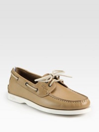 Handsomely crafted from Italian calfskin, this everyday style has a contrast rubber sole and laces.Calfskin upperLeather liningPadded insoleRubber soleMade in Italy Handsomely crafted from Italian calfskin, this everyday style has a contrast rubber sole and laces.Calfskin upperLeather liningPadded insoleRubber soleMade in Italy