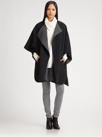 Rich wool crepe, styled with dropped shoulders and wide open sleeves for a distinctive silhouette.Asymmetric button frontDropped shouldersSlash pocketsDraped back90% wool/10% nylonDry cleanImportedModel shown is 5'11 (180cm) wearing US size Small. Rich wool crepe, styled with dropped shoulders and wide open sleeves for a distinctive silhouette.Asymmetric button frontDropped shouldersSlash pocketsDraped back90% wool/10% nylonDry cleanImportedModel shown is 5'11 (180cm) wearing US size Small.