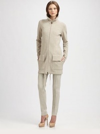 Ultra-soft melange wool, tailored with a high stand collar and generous flap pockets.Stand collarZip front with signature Punto dot pullZip frontSide slash flap pocketsDrawstring hemlineAbout 32 from shoulder to hem95% wool/5% elastaneDry cleanImportedModel shown is 5'9½ (176cm) wearing US size 4. Ultra-soft melange wool, tailored with a high stand collar and generous flap pockets.Stand collarZip front with signature Punto dot pullZip frontSide slash flap pocketsDrawstring hemlineAbout 32 from shoulder to hem95% wool/5% elastaneDry cleanImportedModel shown is 5'9½ (176cm) wearing US size 4.