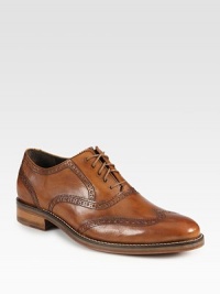 Classic leather wingtips infused with Nike Air technology for superior comfort and on-the-go ease.Leather upperLeather liningPadded insoleLeather/rubber soleImported Classic leather wingtips infused with Nike Air technology for superior comfort and on-the-go ease.Leather upperLeather liningPadded insoleLeather/rubber soleImported