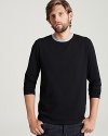 Long sleeve crewneck tee shirt in a comfortable, lightweight cotton. Contrasting, ringer collar.