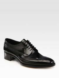 Classic lace-up design handsomely crafted in Italian calfskin leather.Leather upperLeather liningLeather soleMade in Italy Classic lace-up design handsomely crafted in Italian calfskin leather.Leather upperLeather liningLeather soleMade in Italy