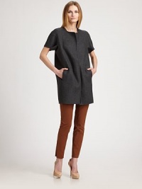 It will be nearly impossible to resist this stretch wool coat, offering a beyond-stylish look.Round neckShort sleevesPull-on styleRelaxed fitAbout 34 from shoulder to hem81% virgin wool/19% polyamideDry cleanMade in ItalyModel shown is 5'10½ (179cm) wearing US size 4. It will be nearly impossible to resist this stretch wool coat, offering a beyond-stylish look.Round neckShort sleevesPull-on styleRelaxed fitAbout 34 from shoulder to hem81% virgin wool/19% polyamideDry cleanMade in ItalyModel shown is 5'10½ (179cm) wearing US size 4.