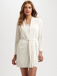 Wrap yourself in this vibrant design for a luxurious take on relaxation. Long sleeves Self belt About 36 from shoulder to hem Polyester Machine wash Imported Wrap yourself in this vibrant design for a luxurious take on relaxation. Long sleeves Self belt About 36 from shoulder to hem Polyester Machine wash Imported