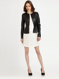Flared hem adds feminine charm to this fitted leather jacket. Front zipperLong sleevesFlared hemFully linedAbout 23 from shoulder to hemLeatherDry clean with leather specialistImported of Italian fabricModel shown is 5'10 (177cm) wearing US size 2. Flared hem adds feminine charm to this fitted leather jacket. Front zipperLong sleevesFlared hemFully linedAbout 23 from shoulder to hemLeatherDry clean with leather specialistImported of Italian fabricModel shown is 5'10 (177cm) wearing US size 2.