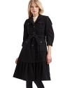 Military styling fused with ladylike influences for a luxurious wool overcoat that commands attention.Notched collar ¾ puffed sleeves with button tabs Front button closure Front button flap pockets Buckled belt ties at the waist Long ruffled hem About 40 from shoulder to hem Fully lined Wool; dry clean Made in Italy
