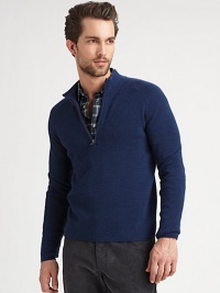 A sleek, knit pullover made from Italian extra-fine wool.Stand collarLong sleevesZipper placketPull-on styleWoolDry cleanImported of Italian fabric A sleek, knit pullover made from Italian extra-fine wool.Stand collarLong sleevesZipper placketPull-on styleWoolDry cleanImported of Italian fabric