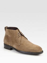 This lace-up chukka exudes casual cool, rendered in a rich suede with a supportive rubber sole for maximum comfort.Ankle pull tabSuede upperLeather liningPadded insoleRubber soleMade in Italy This lace-up chukka exudes casual cool, rendered in a rich suede with a supportive rubber sole for maximum comfort.Ankle pull tabSuede upperLeather liningPadded insoleRubber soleMade in Italy