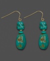 Raw, natural beauty. Marbled turquoise chips (6-7 mm) make these drops an exquisite addition to your fine jewelry collection. Earrings crafted in 14k gold. Approximate drop: 1-1/2 inches.