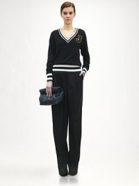 Striped, sporty trim and a signature 'J' appliqué give this wool pullover a collegiate flair.V necklineRib-knit cuffs and hemSignature 'J' appliquéWoolDry cleanMade in ItalyModel shown is 5'11 (180cm) wearing US size 4. Striped, sporty trim and a signature 'J' appliqué give this wool pullover a collegiate flair.V necklineRib-knit cuffs and hemSignature 'J' appliquéWoolDry cleanMade in ItalyModel shown is 5'11 (180cm) wearing US size 4.