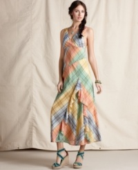 Summery plaid fabric enlivens an ultra-chic maxi silhouette from Tommy Hilfiger. A ruffled panel inset at the side adds a girly flourish, too! Summery plaid fabric enlivens an ultra-chic maxi silhouette from Tommy Hilfiger. A ruffled panel inset at the side adds a girly flourish, too!