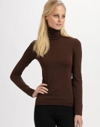 Velvet soft and made in a stretch cotton seamless knit, this pullover is light enough for layering.50% cotton/46% nylon/4% elastene Dry clean Imported