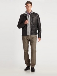Short and trim, this variation on motocross styling in buttery lambskin offers lots of zippers.Band collar with snap close Front zipper Single zip chest pocket Two front zip pockets Long sleeves with zippers at cuffs Back yoke and seaming Fully lined Lambskin leather Dry clean by leather professional Imported Short and trim, this variation on motocross styling in buttery lambskin offers lots of zippers.Band collar with snap close Front zipper Single zip chest pocket Two front zip pockets Long sleeves with zippers at cuffs Back yoke and seaming Fully lined Lambskin leather Dry clean by leather professional Imported