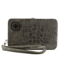 Fab meets function in this posh, croc-embossed wristlet case from Kenneth Cole Reaction that discretely stashes a music player or phone. Provides portal for ear buds so can grove on-the-go, and separate compartments let you bring along cards, cash, coins and ID. Fab meets function in this posh, croc-embossed wristlet case from Kenneth Cole Reaction that discretely stashes a music player or phone. Provides portal for ear buds so can grove on-the-go, and separate compartments let you bring along cards, cash, coins and ID.