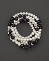 Freshwater pearls and hematite create striking contrast.