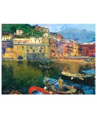 Crafted with an Impressionist's eye, Vernazza evokes all the color and charm of Italy's Cinque Terre region for a touch of European splendor. Brightly painted houses built into the hillside welcome home a fleet of fishermen. Gallery-wrapped canvas completes the piece with contemporary style. By Jerry Blank. Crafted with an Impressionist's eye, Vernazza evokes all the color and charm of Italy's Cinque Terre region for a touch of European splendor. Brightly painted houses built into the hillside welcome home a fleet of fishermen. Gallery-wrapped canvas completes the piece with contemporary style. By Jerry Blank.