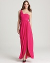 A vibrant hue enlivens this Laundry by Shelli Segal one-shoulder gown, making it a head-turning stunner.