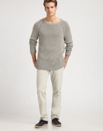 A wardrobe staple: the classic slim-fitting knit in an airy, lightweight cotton and silk blend.CrewneckLong raglan sleeves55% silk/45% cottonHand washImported