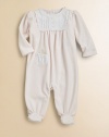 A beautiful long-sleeved footed coverall in plush velour is highlighted with a pretty pintucked bib.CrewneckLong puff sleevesBack buttonsFront patch pocketBottom snapsCottonMachine washImported Please note: Number of buttons/snaps may vary depending on size ordered. 