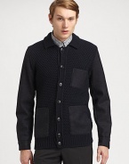 Chunky cardigan sweater knitted in superior wool with contrasting fabric sleeves for a handsomely modern finish.Button-frontChest, waist patch pocketsRibbed knit hemWoolDry cleanMade in Italy