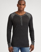 A classic henley sweater gets a contemporary feel in cozy, cotton accented by striped shoulder detail.CrewneckFour-button placketCottonMachine washImported