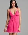 OnGossamer's pretty-in-pink nightie lends feminine flair with a shirred neckline and scalloped trim.