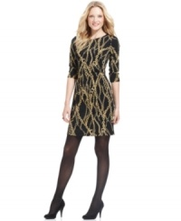 Update and elevate your wardrobe in NY Collection's chain-print dress, finished with gleaming gold hardware at the left hip. Update and elevate your wardrobe in NY Collection's chain-print dress, finished with gleaming gold hardware at the left hip.