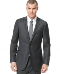 The perfect jacket. This DKNY slim-fit charcoal style gives your torso the shape it needs for a clean, streamlined look.