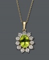 Revive your style in scintillating color. Bright oval-cut peridot (1-1/3 ct. t.w.) pops within a halo of round-cut diamond accents. Pendant crafted in 14k gold and rhodium-plated 14k gold. Approximate length: 18 inches. Approximate drop: 3/4 inch.
