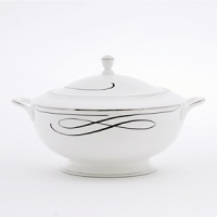 Waterford's Ballet Ribbon bone china dinnerware echoes the graceful forms and lines of the interpretive dance and the satin ribbons which adorn ballerinas' costumes and pointe shoes. Mix in the brightly colored accent plates to make your table pop or to blend the pattern into your dining décor. Waterford's Ballet Ribbon bone china dinnerware echoes the graceful forms and lines of the interpretive dance and the satin ribbons which adorn ballerinas' costumes and pointe shoes. Mix in the brightly colored accent plates to make your table pop or to blend the pattern into your dining décor.