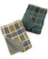 Change up your look (without losing the warmth) with the sleek reversible style of this super-soft plaid scarf from Fossil.