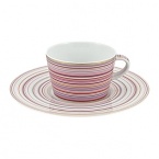 Inspired by Milleraies, Raynaud's spearhead tableware set, Attraction boasts a freer, more modern design with alternating narrow and wide stripes. It will embellish any table with its shades of pink and red, enhanced with mauve and orange and underscored subtle shades of green and brown.