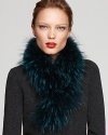 Richly appointed in plush fur, this Adrienne Landau scarf makes a luxurious impact day or night.