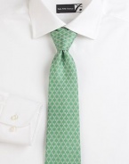 A charming, uniquely illustrated design, woven in fine Italian silk.SilkDry cleanMade in Italy