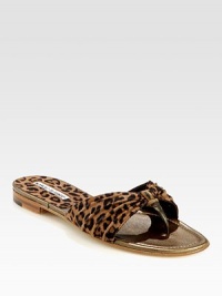 Butter-soft suede takes on an exotic leopard print in this comfortable basic with shimmery metallic leather trim. Suede upper with metallic leather trimMetallic leather liningLeather solePadded insoleMade in Italy Butter-soft suede takes on an exotic leopard print in this comfortable basic with shimmery metallic leather trim. Suede upper with metallic leather trimMetallic leather liningLeather solePadded insoleMade in Italy